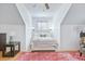 Bright bedroom features an inviting bed and stylish accent rug at 1104 Old Course Ln, Mount Pleasant, SC 29466