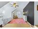 Bedroom with a comfortable bed, stylish decor and dark accent wall at 1104 Old Course Ln, Mount Pleasant, SC 29466