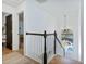Upstairs landing with view of backyard, showcasing patio and jacuzzi at 1104 Old Course Ln, Mount Pleasant, SC 29466