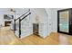 Stylish living area with a wine fridge, staircase, and easy access to outdoor spaces at 1104 Old Course Ln, Mount Pleasant, SC 29466