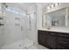 Modern bathroom featuring a glass walk-in shower with marble tile and a dual shower head at 1114 Donerail Ln, Johns Island, SC 29455