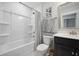 This full bath features a tub with shower, single vanity, and framed mirror at 1114 Donerail Ln, Johns Island, SC 29455