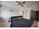 Comfortable bedroom featuring a ceiling fan, neutral colors, and a view into an attached bathroom at 1114 Donerail Ln, Johns Island, SC 29455