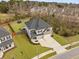 Beautiful two-story home featuring a well-manicured lawn, spacious driveway, and attached two-car garage at 1114 Donerail Ln, Johns Island, SC 29455