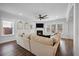 Cozy living room featuring large windows and fireplace at 1114 Donerail Ln, Johns Island, SC 29455