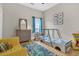 This cozy bedroom features a unique race car bed, neutral walls, and a colorful rug at 12 Trachelle Ln, Charleston, SC 29407