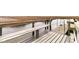 A dock with bench seating sits next to calm waters at 12 Trachelle Ln, Charleston, SC 29407