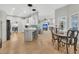 Bright and airy open-concept layout seamlessly connects the kitchen, dining, and living areas at 12 Trachelle Ln, Charleston, SC 29407