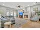 Bright living room with hardwood floors, fireplace, and comfortable seating arrangement at 12 Trachelle Ln, Charleston, SC 29407