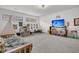 This bright playroom is a ' paradise with plenty of space to play and a TV for entertainment at 12 Trachelle Ln, Charleston, SC 29407
