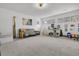 Large playroom is a dream with a plush rug and a variety of toys and books at 12 Trachelle Ln, Charleston, SC 29407