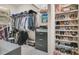 Organized walk-in closet featuring shelving, drawers, hanging racks, and storage space for clothes and shoes at 12 Trachelle Ln, Charleston, SC 29407