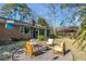 Backyard featuring outdoor seating, fire pit, and access to the sunroom at 1228 Penny Cir, Mount Pleasant, SC 29464