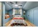 Charming bedroom with sloped ceilings, built-in bench, and plentiful natural light at 1228 Penny Cir, Mount Pleasant, SC 29464