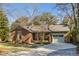 Charming brick home with a well-manicured lawn, a paved driveway, and inviting curb appeal at 1228 Penny Cir, Mount Pleasant, SC 29464
