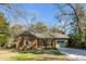 Charming brick home with a well-manicured lawn and inviting curb appeal at 1228 Penny Cir, Mount Pleasant, SC 29464