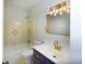 Bathroom with a shower-tub combo, toilet, sink, vanity, and stylish light fixture at 1258 Redeemer Dr, Hanahan, SC 29410
