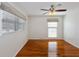 Bright bedroom with hardwood floors, ceiling fan, and ample natural light at 1258 Redeemer Dr, Hanahan, SC 29410