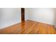 Bright bedroom with hardwood floors and white walls showcasing a clean, modern aesthetic at 1258 Redeemer Dr, Hanahan, SC 29410