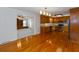 Open-concept kitchen and dining area with classic wood cabinetry and stainless steel appliances at 1258 Redeemer Dr, Hanahan, SC 29410