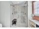 Marble tiled walk-in shower with dual shower heads and integrated seating enhances this bathroom's appeal at 126 Moon Shadow Ln, Summerville, SC 29485