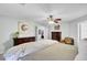 Bedroom with hardwood furniture set including dressers, and leather chair at 126 Moon Shadow Ln, Summerville, SC 29485