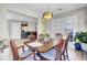 The open floor plan features a dining area with backyard access and flows into the kitchen at 126 Moon Shadow Ln, Summerville, SC 29485