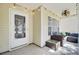 Covered front porch featuring a cozy seating area and decorative lighting at 126 Moon Shadow Ln, Summerville, SC 29485