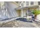 Inviting front porch with outdoor seating and decorative plants at 126 Moon Shadow Ln, Summerville, SC 29485