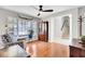 Bright room with hardwood floors, a ceiling fan, and stairs to the upper level at 126 Moon Shadow Ln, Summerville, SC 29485