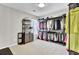 Spacious walk-in closet with extensive shelving and hanging racks at 126 Moon Shadow Ln, Summerville, SC 29485