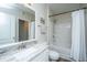 Bathroom featuring marble vanity top, white tiles and shower-tub combination at 1300 Park West Blvd # 418, Mount Pleasant, SC 29466