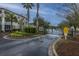 Gated entrance to community with lush landscaping and secure access at 1300 Park West Blvd # 418, Mount Pleasant, SC 29466