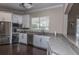 This modern kitchen features stainless steel appliances, granite countertops, and ample cabinet space at 1300 Park West Blvd # 418, Mount Pleasant, SC 29466