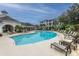 Resort-style pool with ample lounge chairs and a charming cabana area for ultimate relaxation at 1300 Park West Blvd # 418, Mount Pleasant, SC 29466