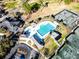 Aerial view of community pool, tennis courts, clubhouse, and golf course amenities at 1407 Congressional Blvd, Summerville, SC 29483