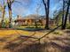 Beautiful backyard with a hammock inviting you to relax and enjoy the serene natural surroundings at 1407 Congressional Blvd, Summerville, SC 29483