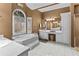 Bathroom showcasing a soaking tub, tile floors, and neutral color scheme at 1407 Congressional Blvd, Summerville, SC 29483