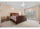 Comfortable bedroom featuring a bed, ceiling fan, and a beautiful window at 1407 Congressional Blvd, Summerville, SC 29483