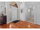 Bright entryway with hardwood floors, white walls, and an arched doorway at 1407 Congressional Blvd, Summerville, SC 29483