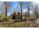 Mature trees surround the home, offering shade and privacy, while highlighting the architectural details at 1407 Congressional Blvd, Summerville, SC 29483