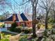Beautifully landscaped brick home with attached garage, perfect for suburban living and outdoor enjoyment at 1407 Congressional Blvd, Summerville, SC 29483