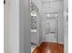 Hallway leading to a powder room and laundry room, connecting the main house at 1407 Congressional Blvd, Summerville, SC 29483