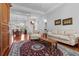 Spacious living room with hardwood floors, a large rug, and a charming neutral sofa at 1407 Congressional Blvd, Summerville, SC 29483