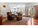 Open-concept living room and kitchen with patio access, perfect for entertaining guests at 1407 Congressional Blvd, Summerville, SC 29483