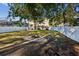 Spacious fenced backyard with a fire pit area and ample space for outdoor activities and relaxation at 1452 Water Edge Dr, Charleston, SC 29492