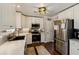 Updated kitchen with stainless steel appliances, white cabinetry, and contemporary design at 1452 Water Edge Dr, Charleston, SC 29492