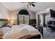Spacious main bedroom with a large window, ceiling fan, and comfortable bed at 1452 Water Edge Dr, Charleston, SC 29492