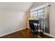 Well-lit office space with hardwood floors, a large window, and a functional work area at 1452 Water Edge Dr, Charleston, SC 29492