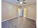 Spacious bedroom featuring a ceiling fan and wood-look flooring at 1600 Long Grove Dr # 1313, Mount Pleasant, SC 29466